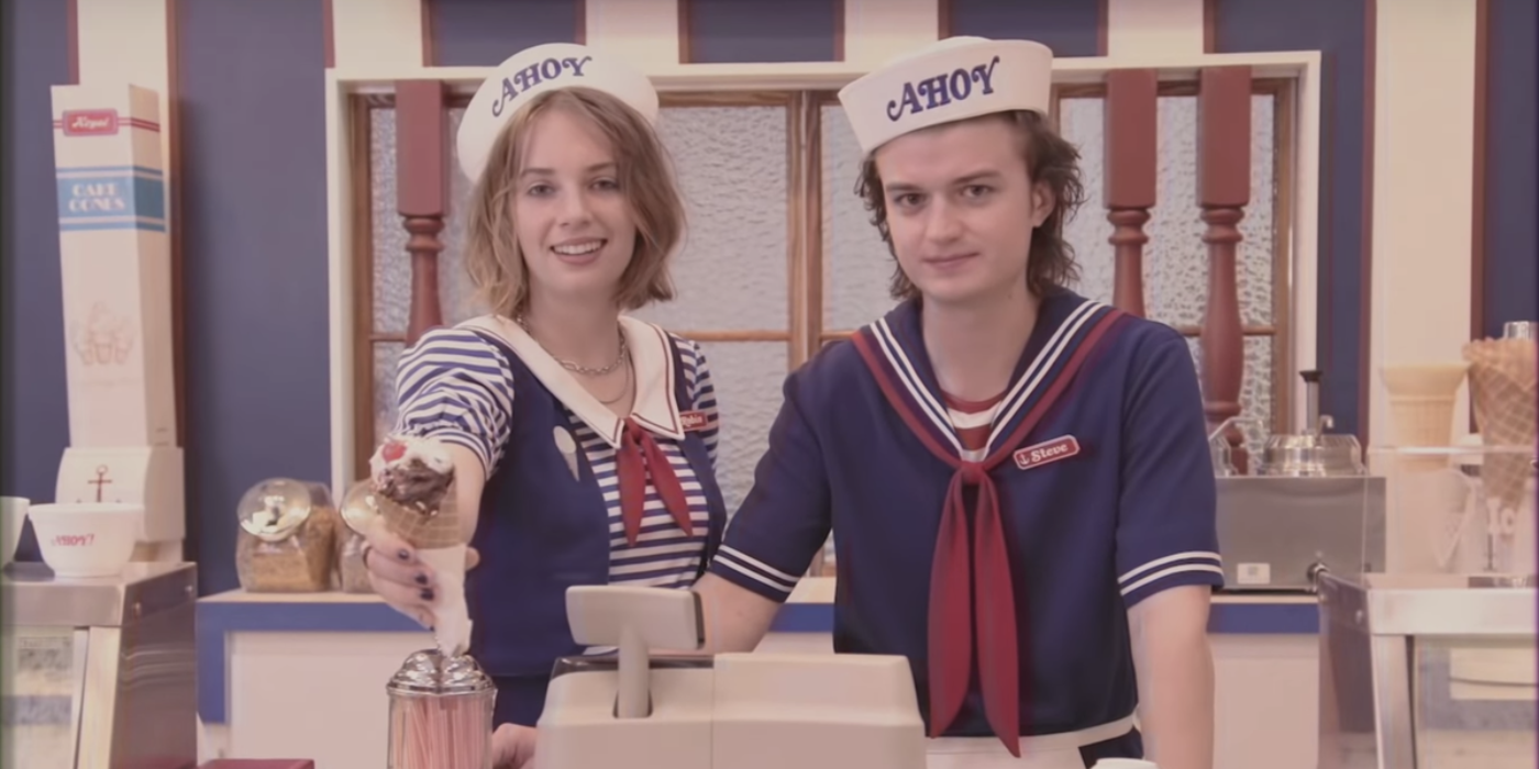 Steve and Robin In Their Uniforms Behind The Counter