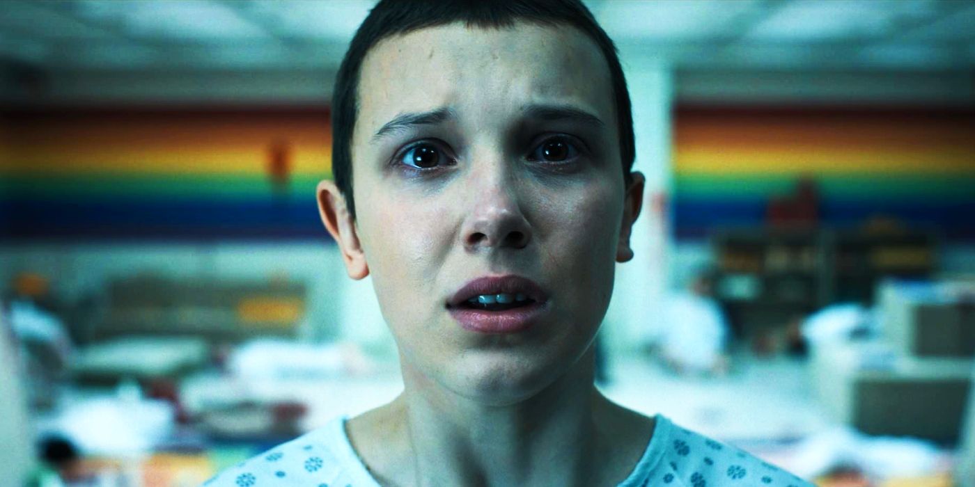 Millie Bobby Brown as Eleven looking worried in Stranger Things.