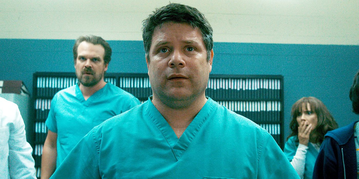 Hopper (David Harbour), Bob Newby (Sean Astin), and Joyce (Winona Ryder) looking surprised in Stranger Things