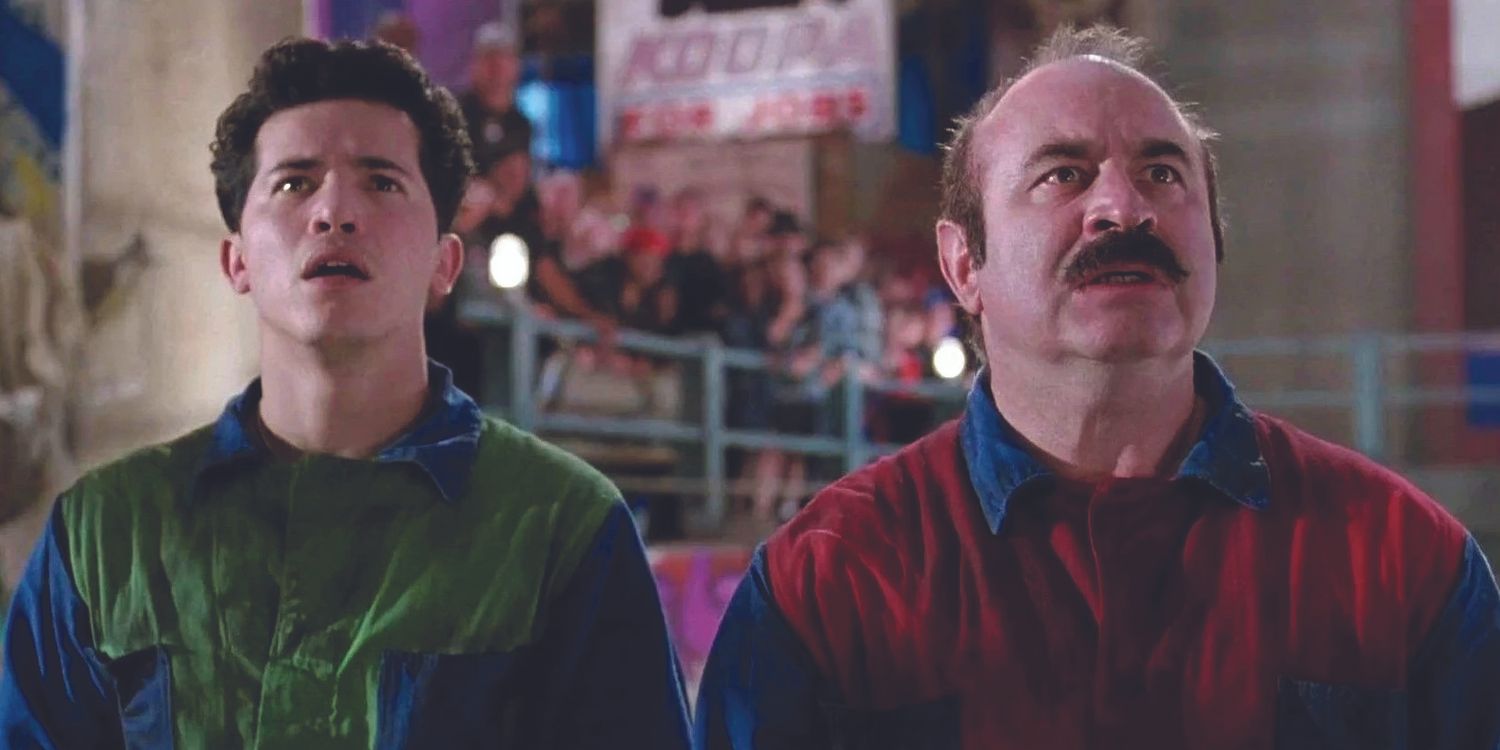 Bob Hoskins as Mario and John Leguizamo as Luigi looking up in Super Mario Bros. 1993
