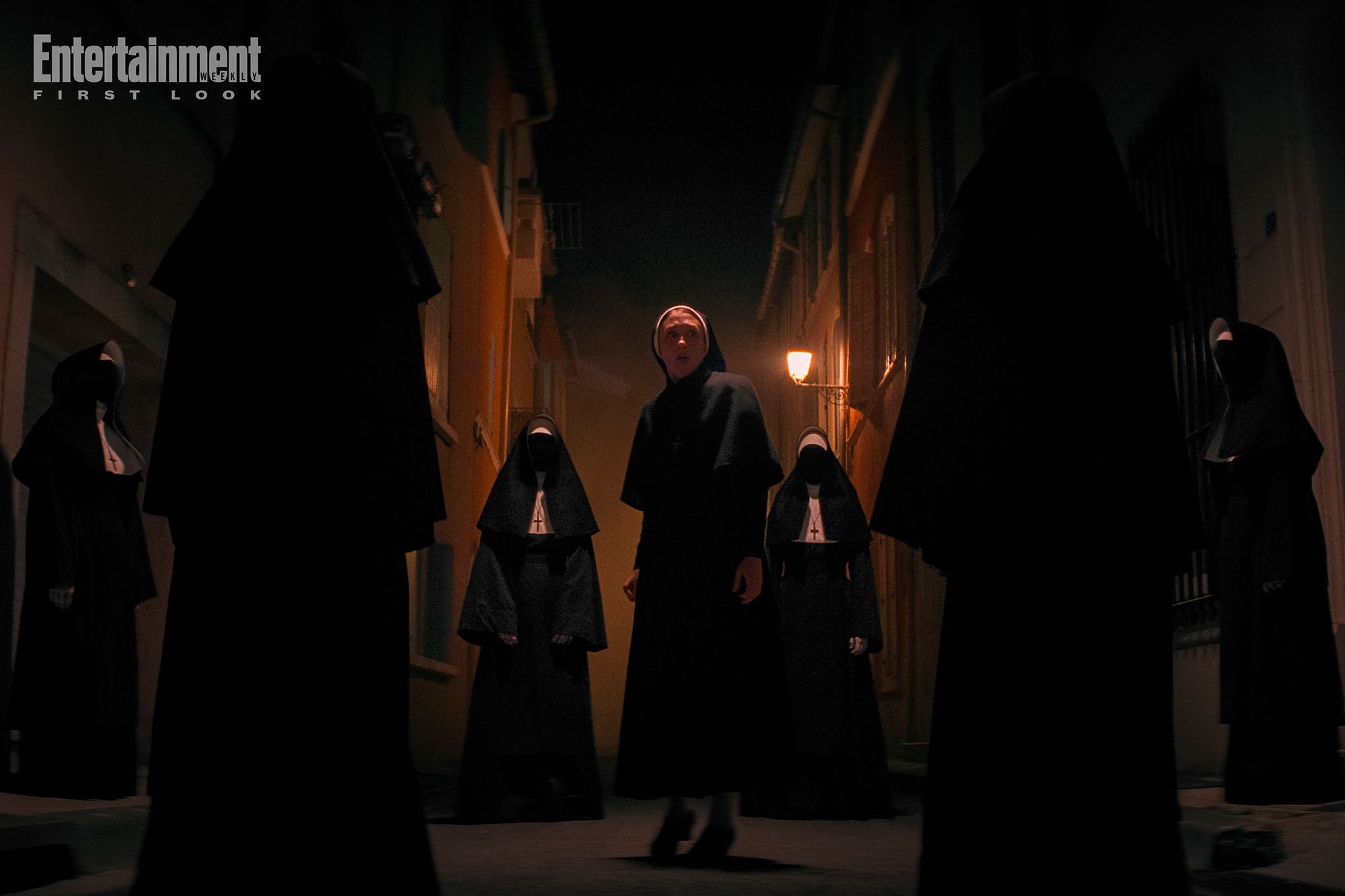 Taissa Farmiga as Sister Irene Surrounded by Demonic Nuns in The Nun 2