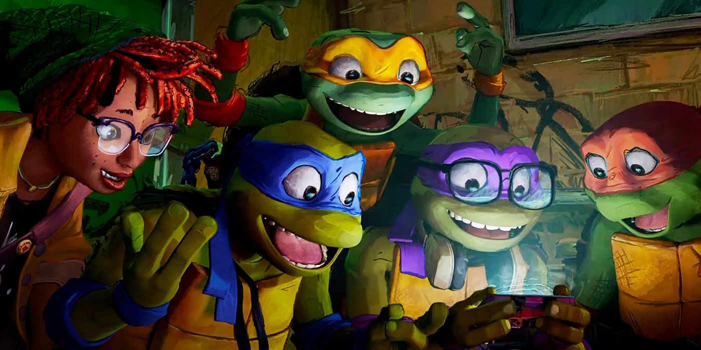 April dan Turtles melihat layar ponsel di Teenage Mutant Ninja Turtles: Mutant Mayhem