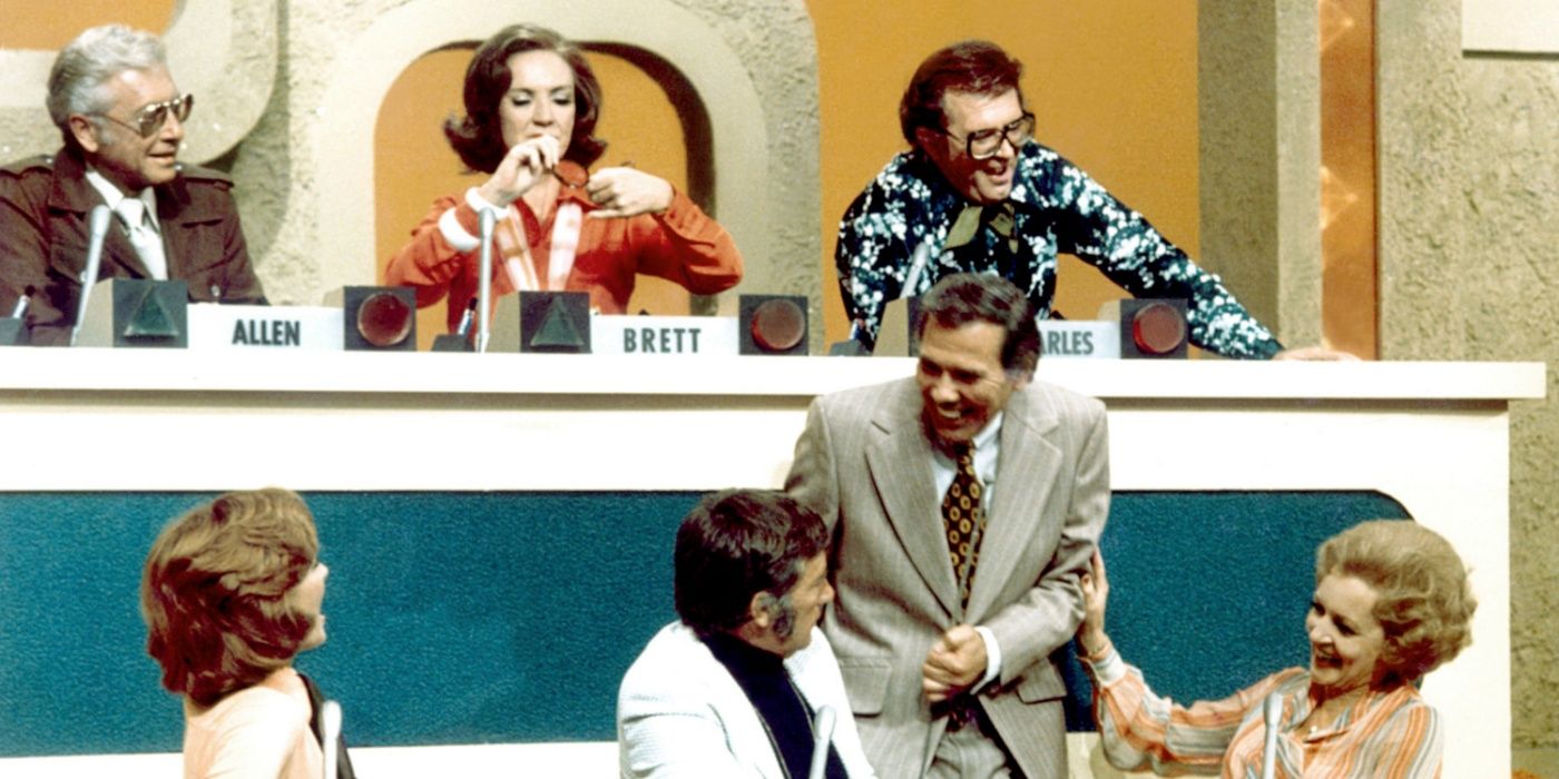 The celebrities smiling on Match Game.