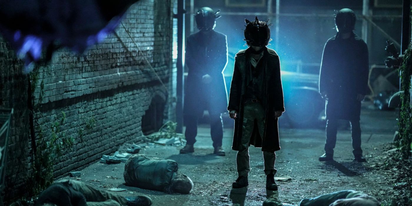 The Croat and his Burazi henchmen wear horned helmets and stand in an alleyway in The Walking Dead Dead City