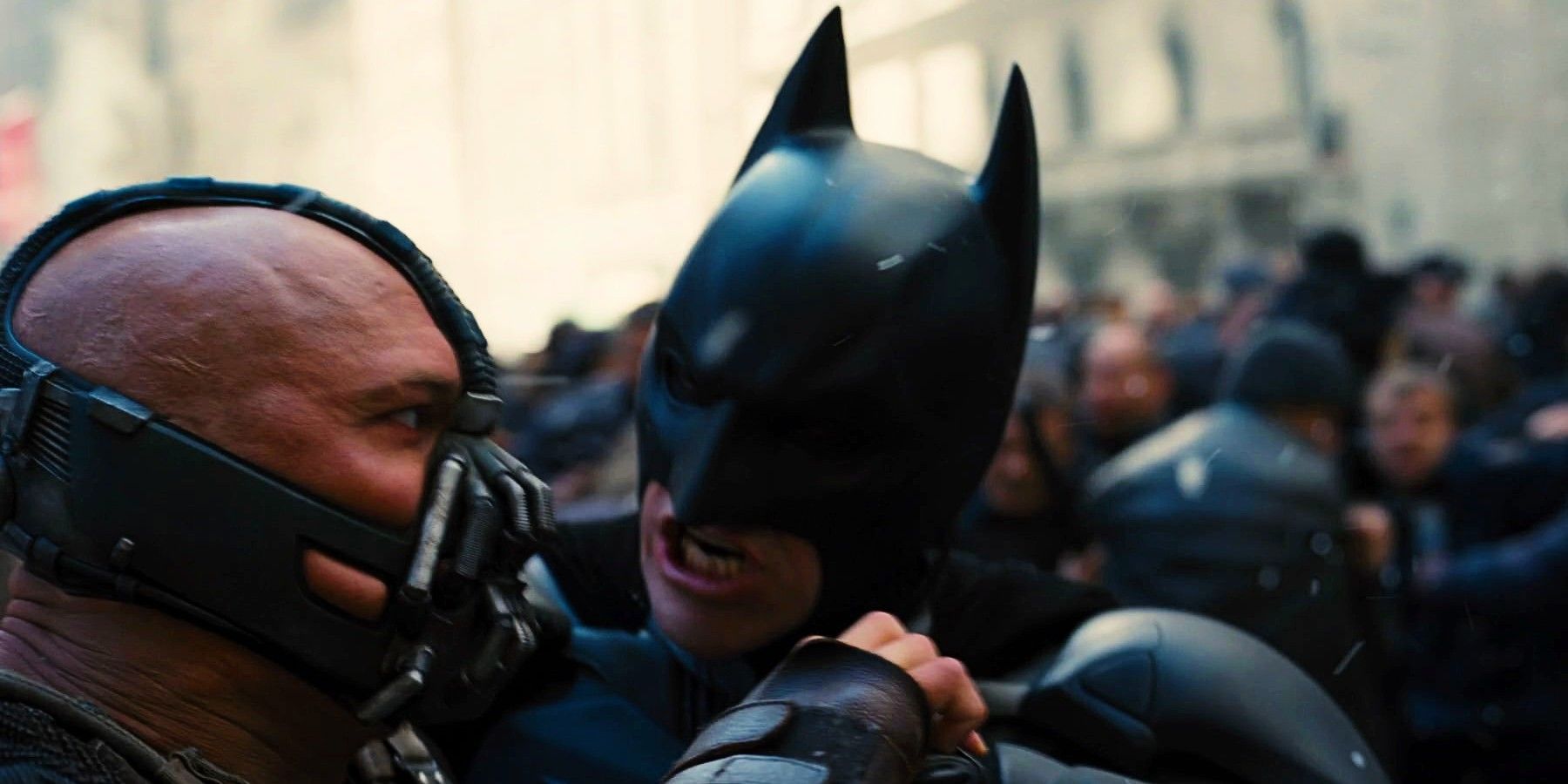 A scene from The Dark Knight Rises with Batman fighting Bane.