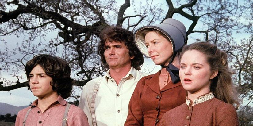 The Ingalls family looking into the distance on Little House on the Prairie.