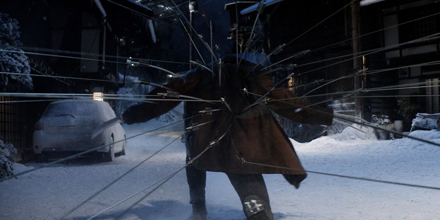 Hugh Jackman as Logan in The Wolverine being shot with arrows