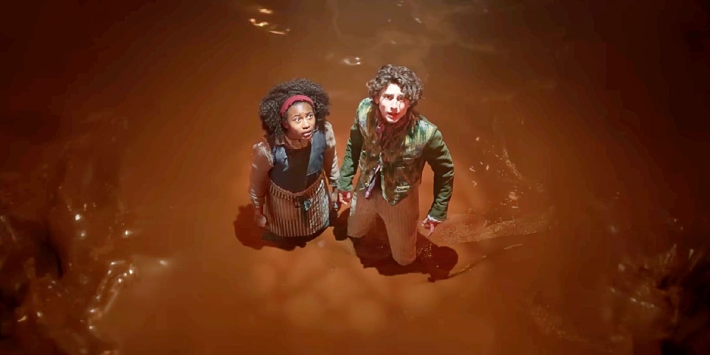 Timothee Chalamet and Calah Lane Standing in a Vat of Chocolate in Wonka