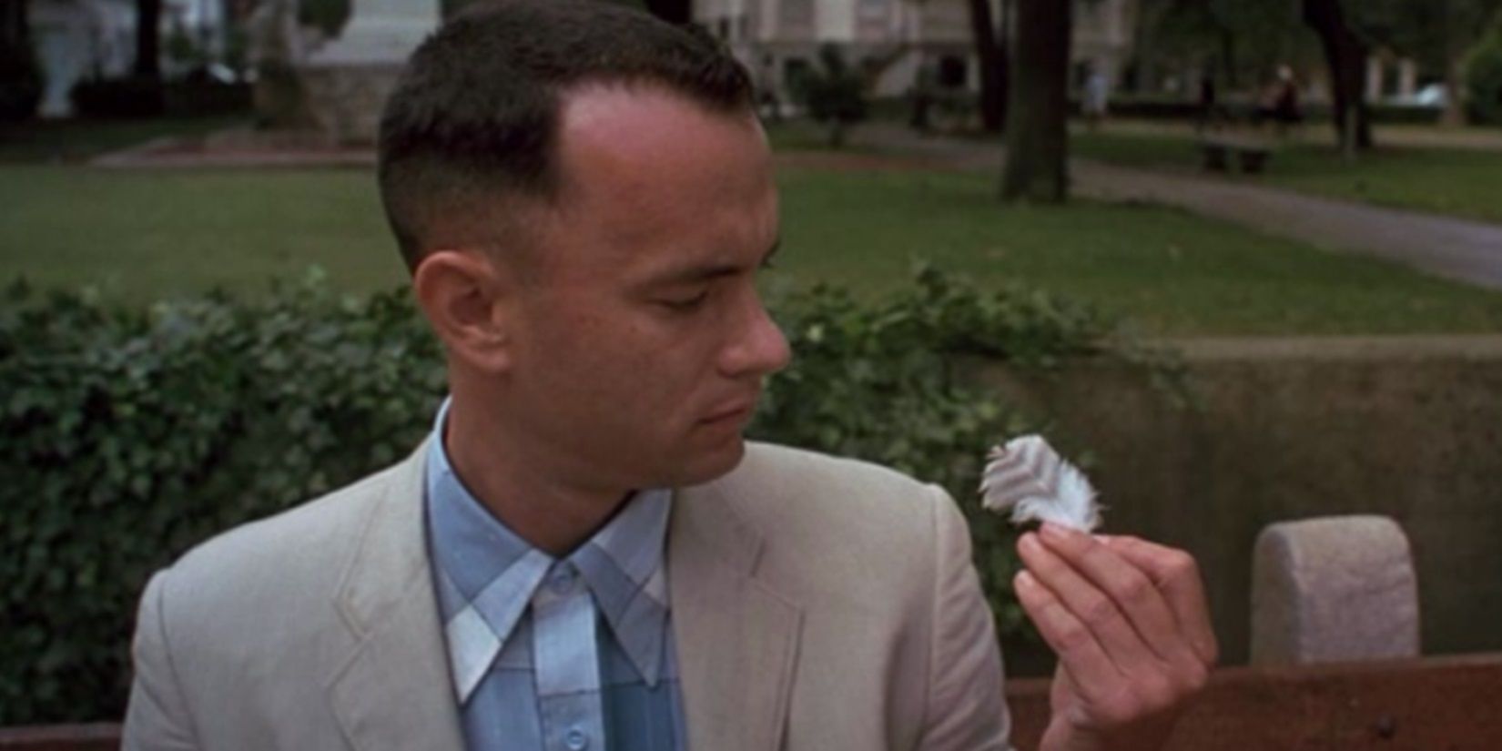 Tom Hanks holds a feather in Forrest Gump-1