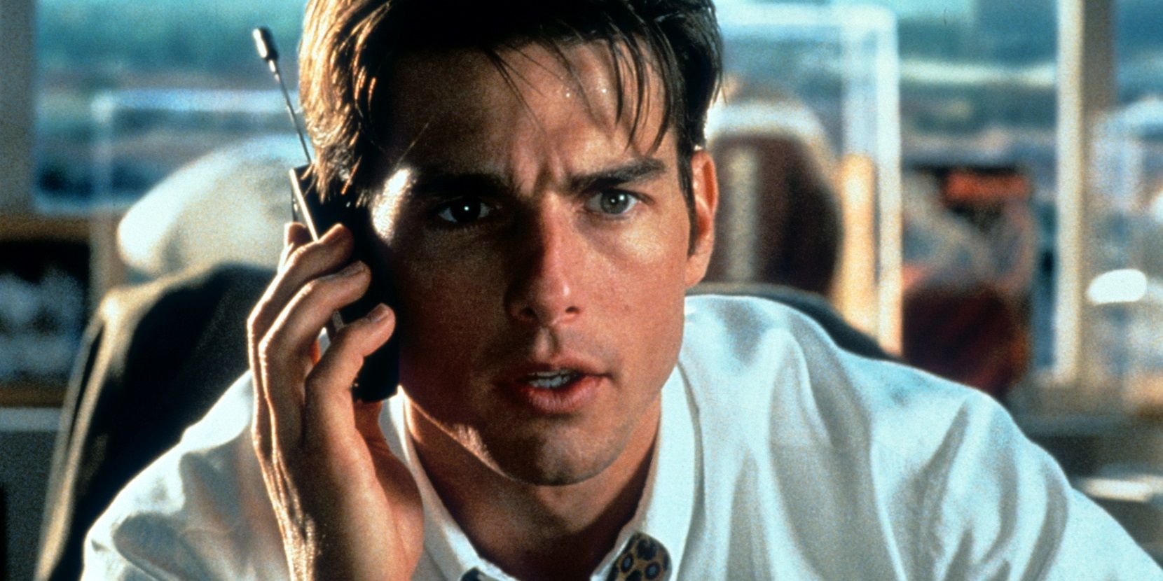 Tom Cruise ao telefone em Jerry Maguire