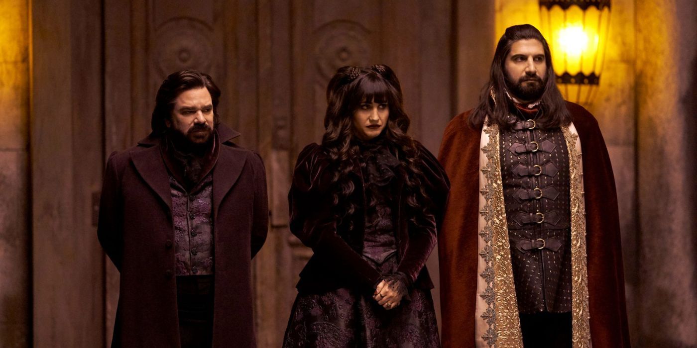Nadya, Lazlo, and Nandor looks dejected while standing by the door in What We Do In The Shadows