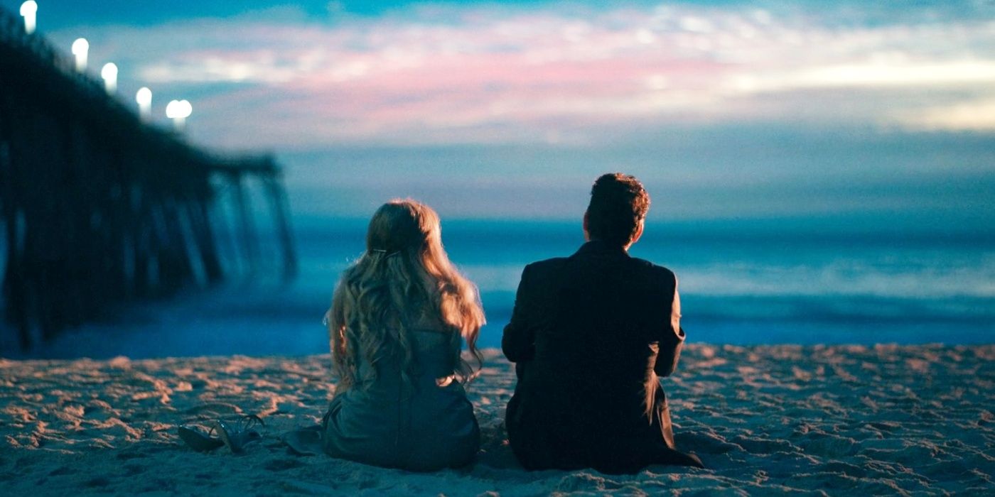 Zoey and Chase sit on the beach in Zoey 102.