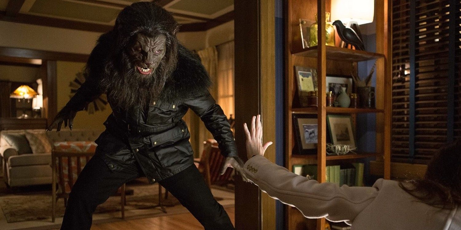 A creature threatens a woman in an office in Grimm.