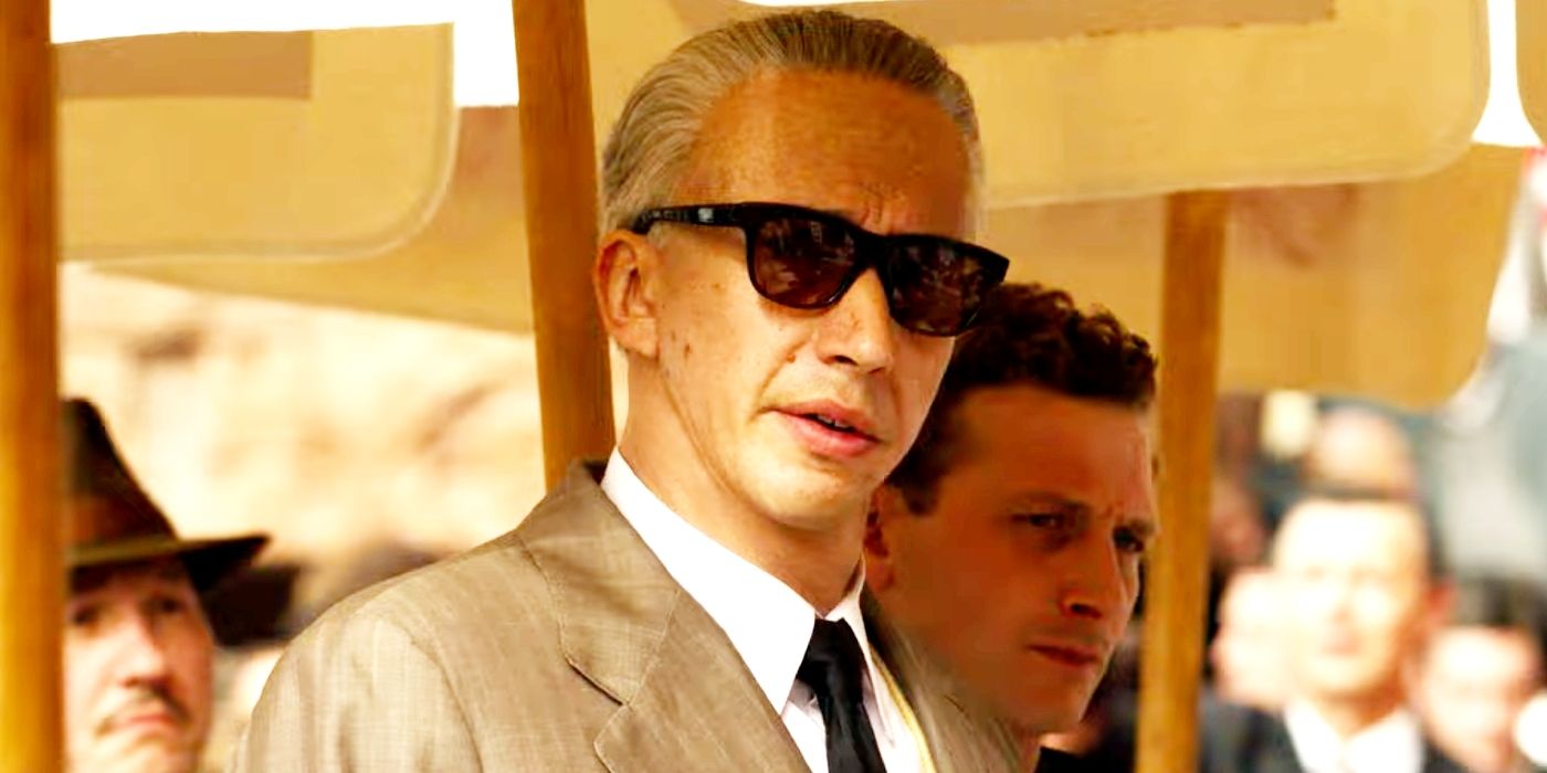Adam Driver as Enzo Ferrari wearing sunglasses