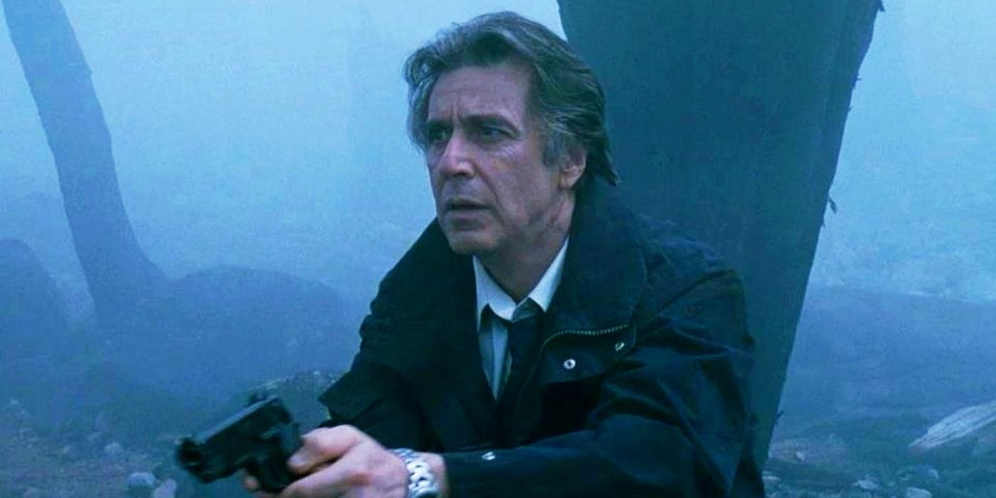 Al Pacino holding a gun in the fog in Insomnia.