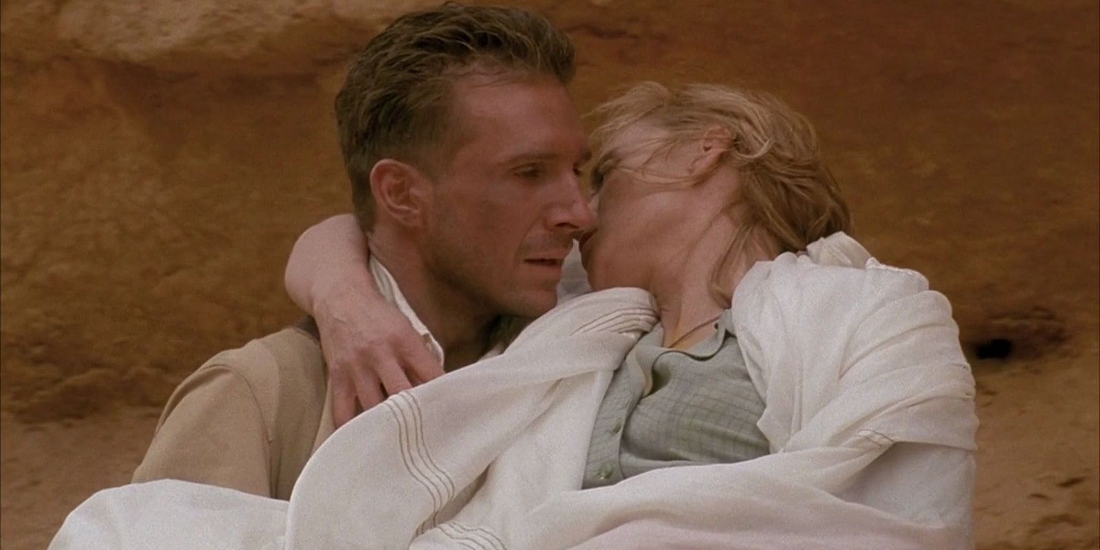 Almasy carries Katharine in The English Patient