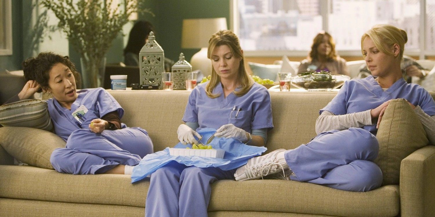 An image of Cristina, Izzie and Meredith sitting on a couch in Grey&rsquo;s Anatomy
