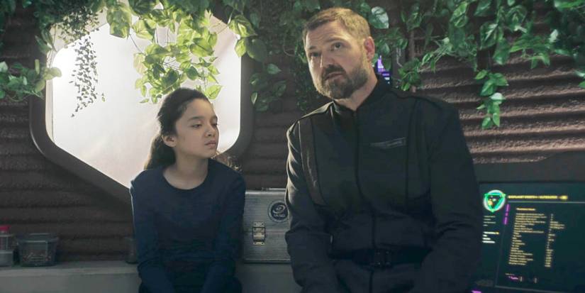 An image of Winston Duarte (Dylan Taylor) and Cara (Emma Ho) talking in The Expanse