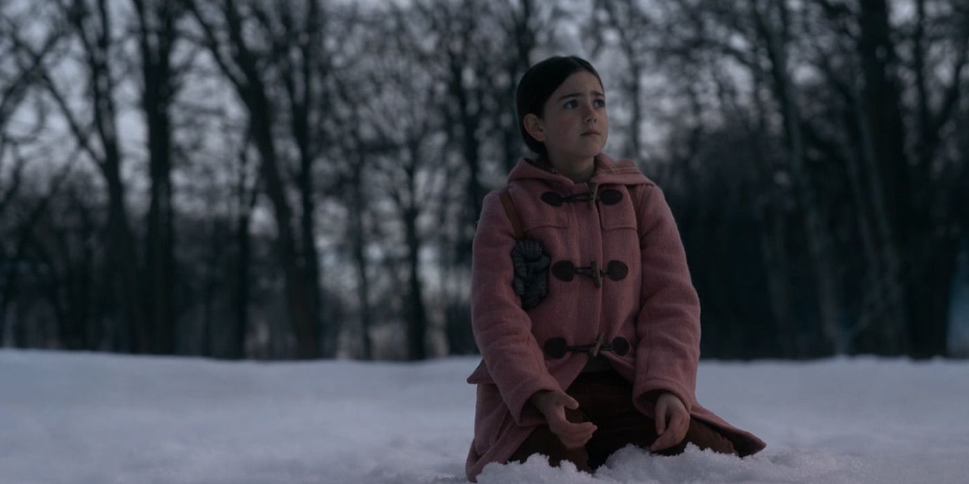 Abby Ryder Fortson kneels in the snow in Tales from the Loop
