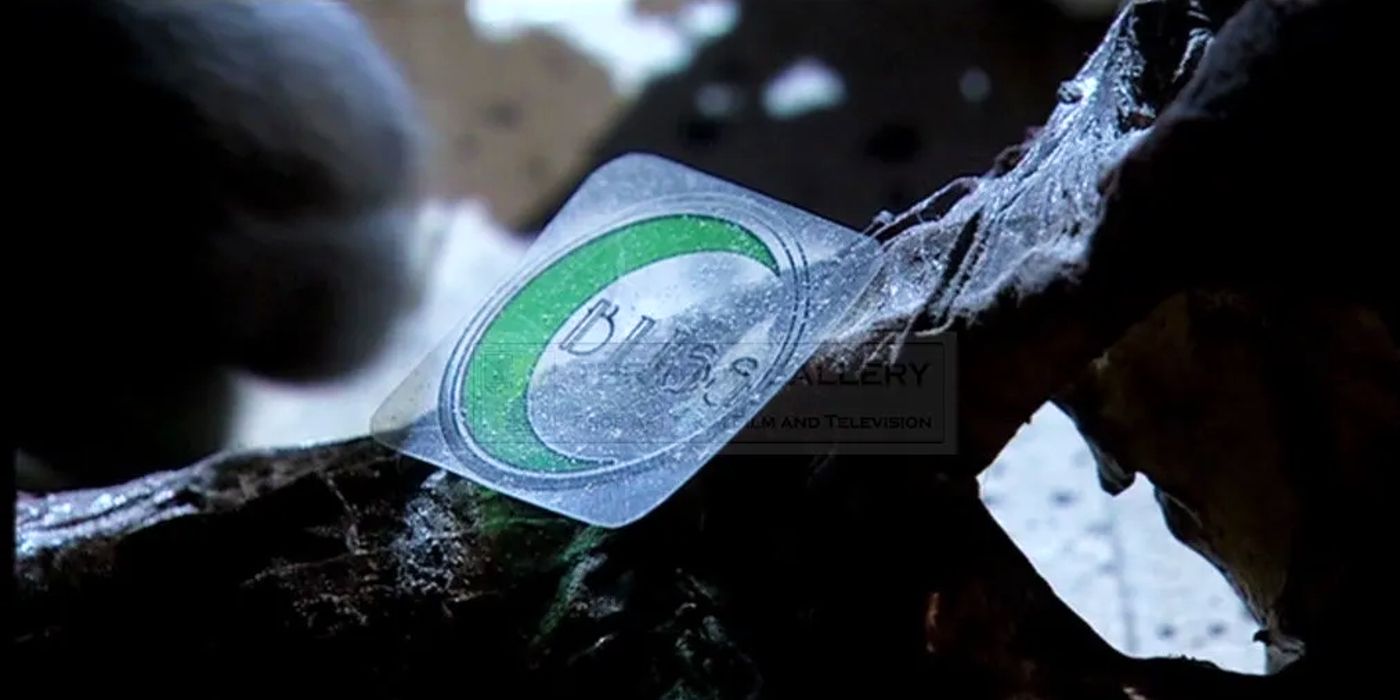 A sticker show the word &ldquo;Bliss&rdquo; with a green crescent moon next to it.