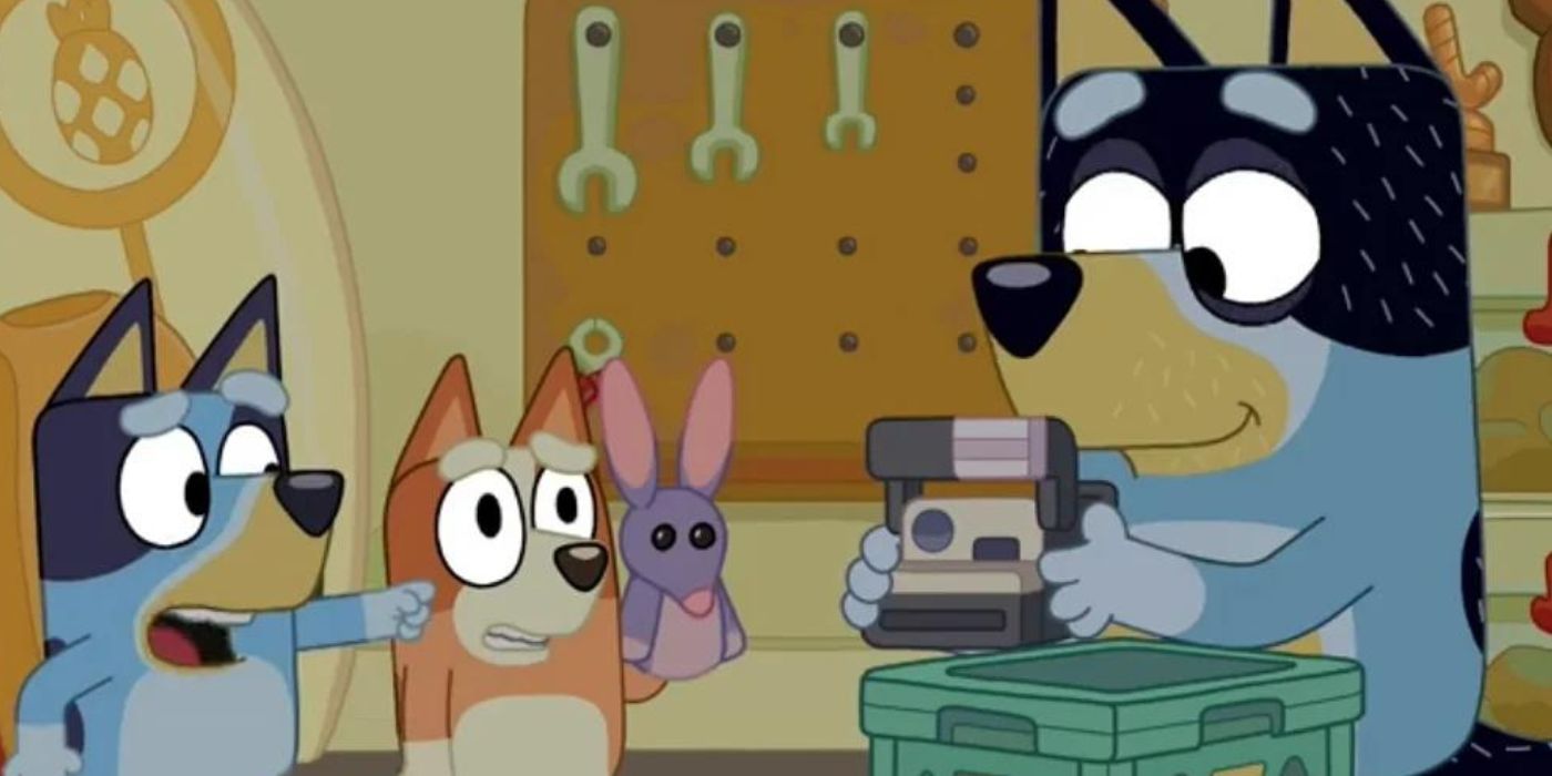 Bluey, Bingo, and Bandit with polaroid camera