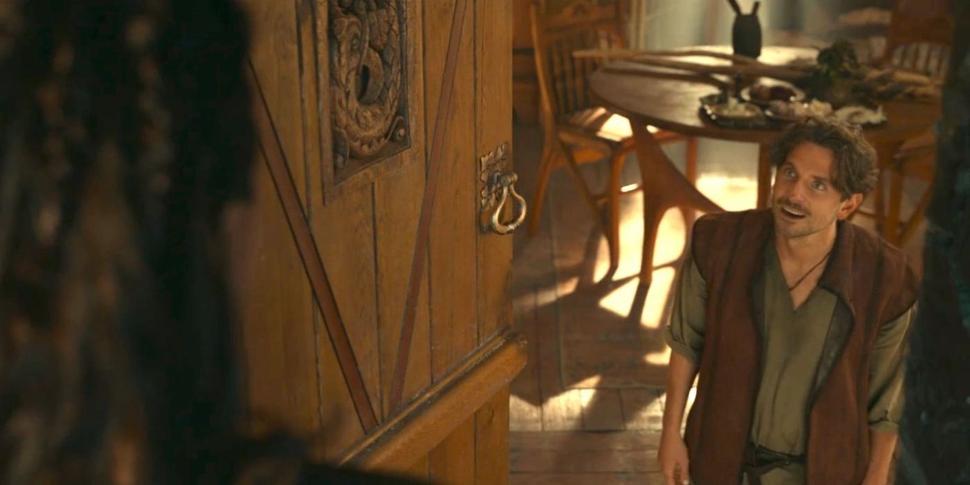 Bradley Cooper as Marlamin greeting Holga (Michelle Rodriguez) at the door in Dungeons and Dragons Honor Among Thieves.