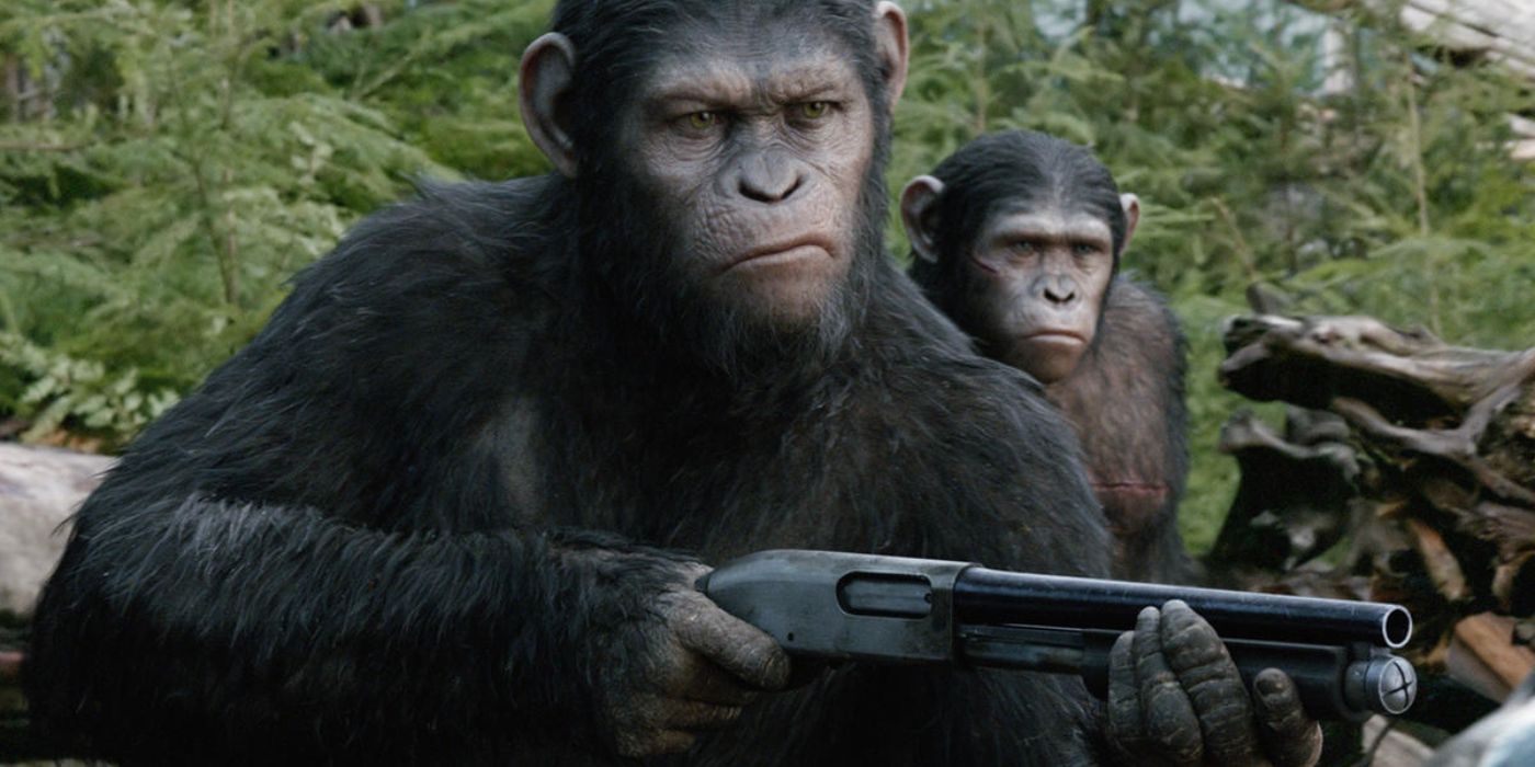 Caesar holding a gun in Dawn of the Planet of the Apes