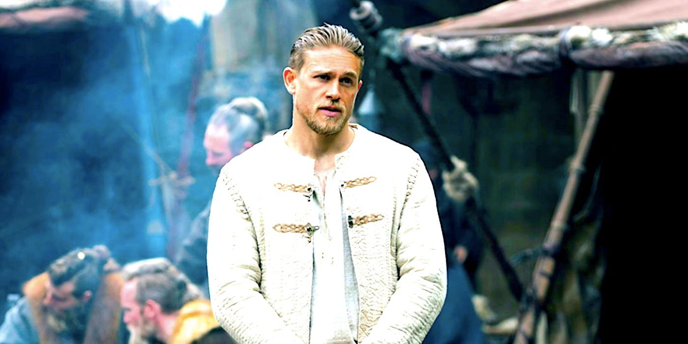 Charlie Hunman as Arthur wearing white in King Arthur: Legend of the Sword