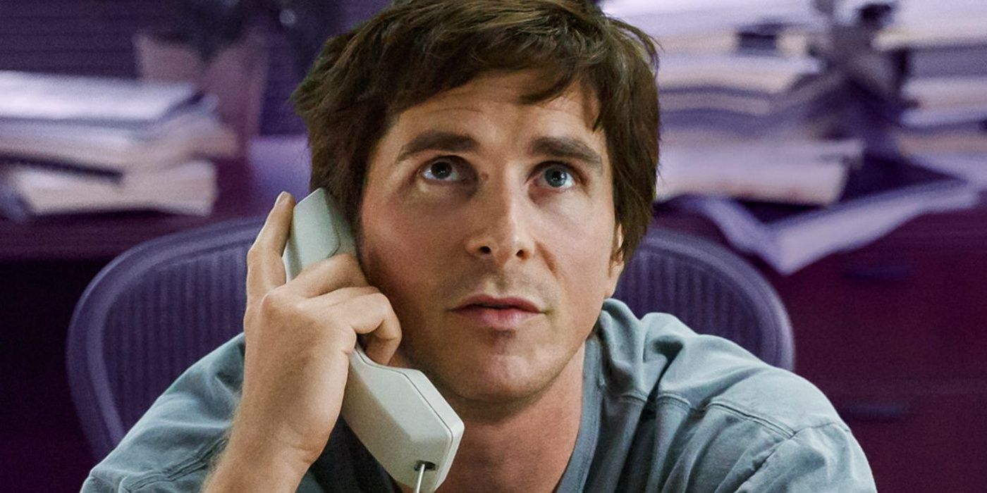 Christian Bale as Michael on the phone, looking up in The Big Short