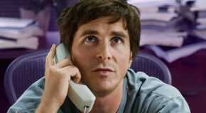 Christian Bale as Michael Burry on the phone, looking up in The Big Short