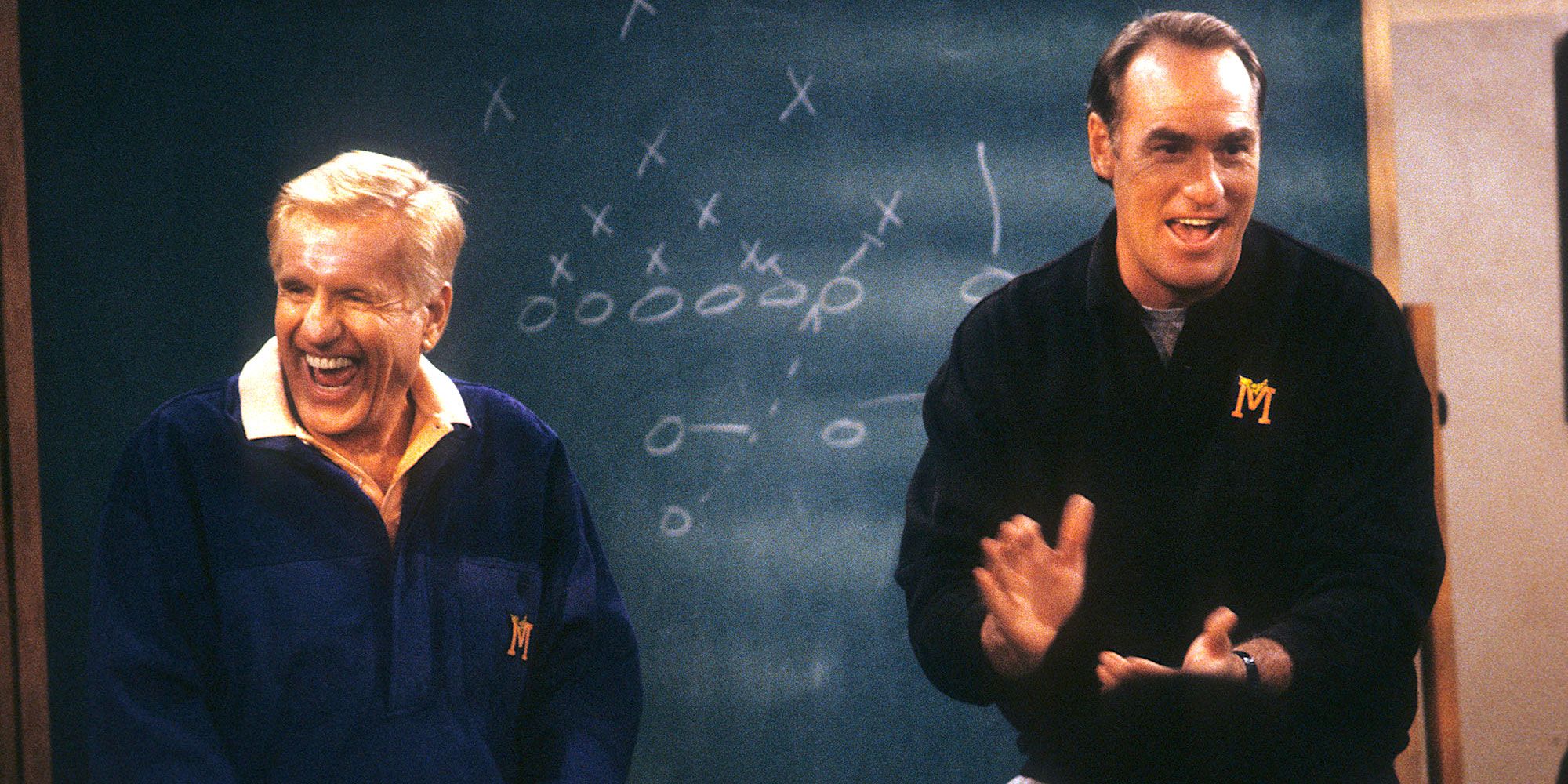Jerry Van Dyke and Craig T. Nelson in front of a blackboard on the TV show Coach.