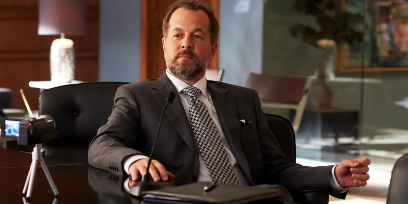 Daniel Hardman sits at his desk in Suits