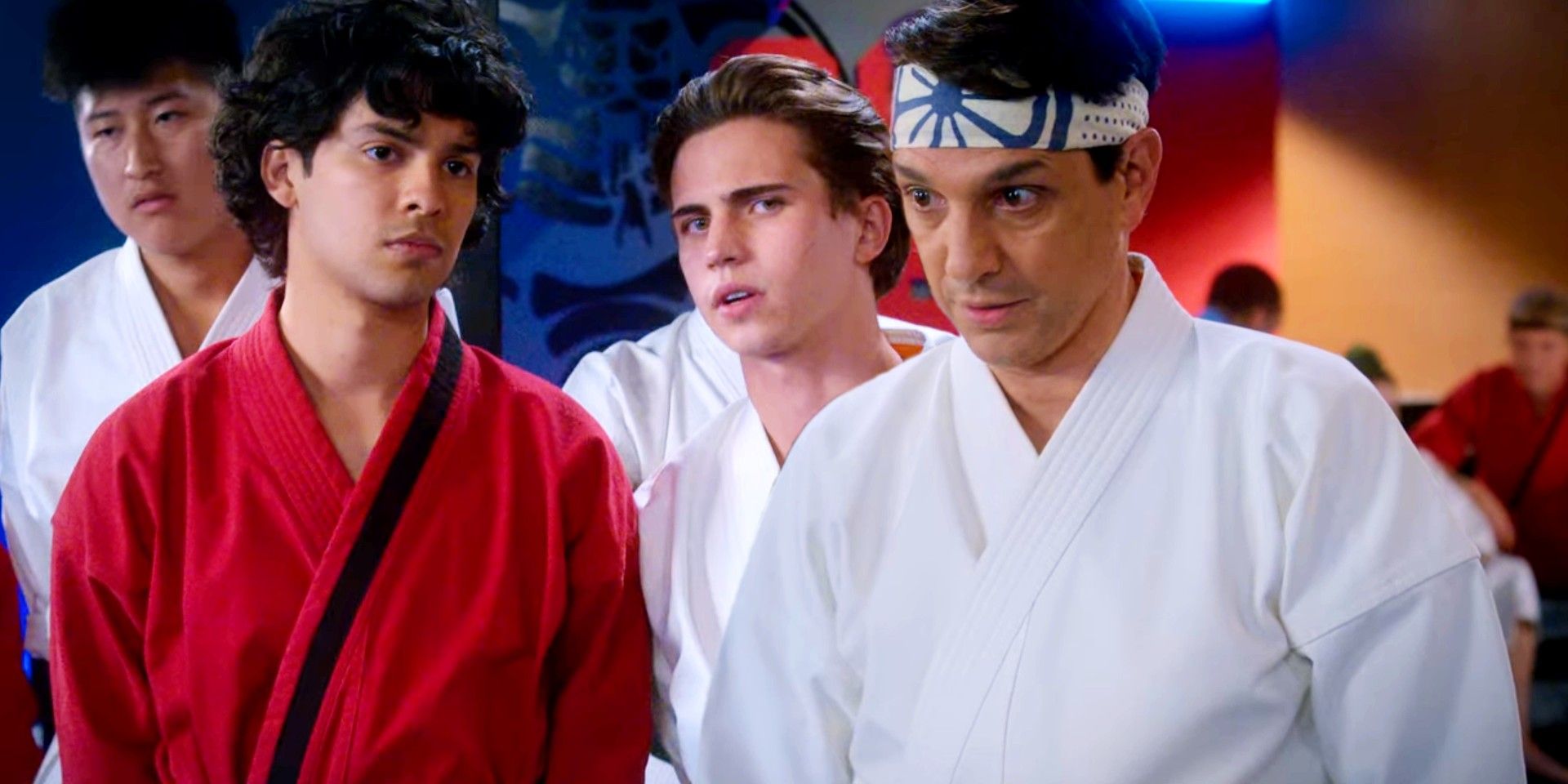 Custom image of Daniel talking to Sam and Miguel listening to Robby in Cobra Kai