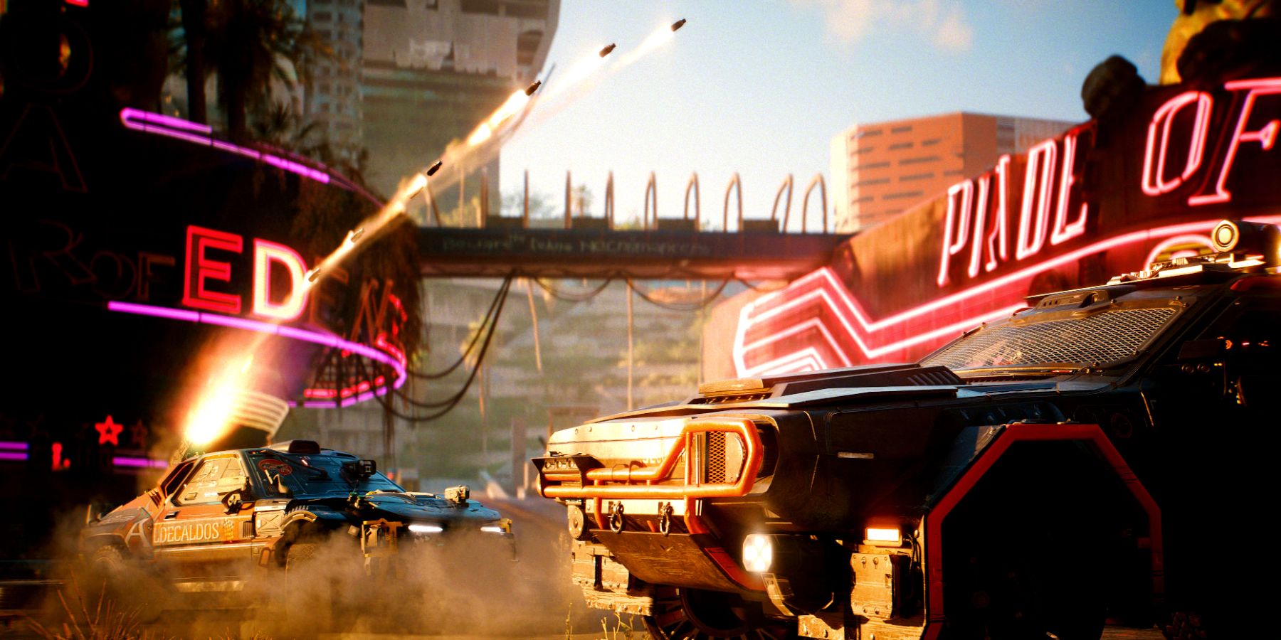 A car in the background sits in a cloud of dusk while missiles launch from a battery mounted on its back end toward a car in the foreground. Both vehicles are situated in front of neon sign-lit buildings in Night City.