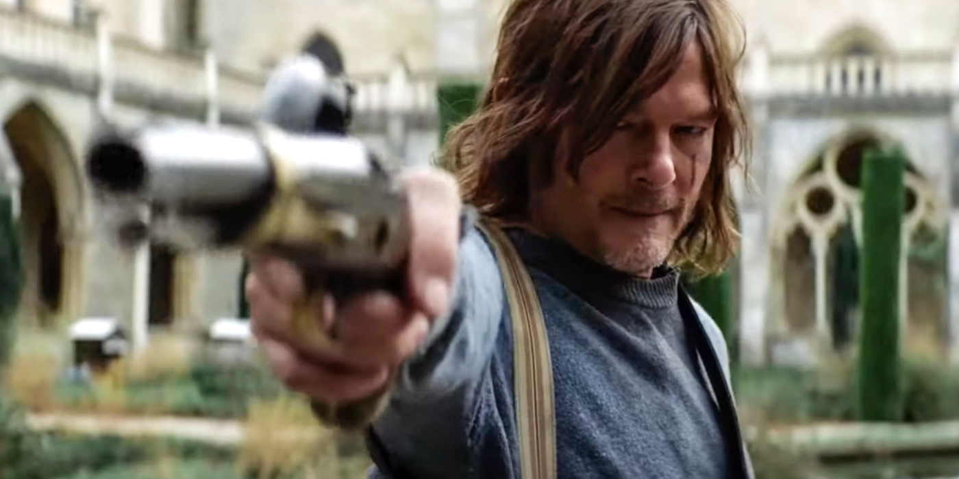 Daryl Dixon pointing a gun off camera and looking beat