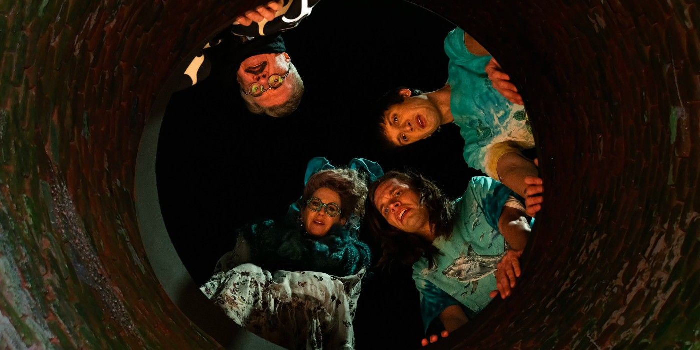 Dicks The Musical cast looking down a well