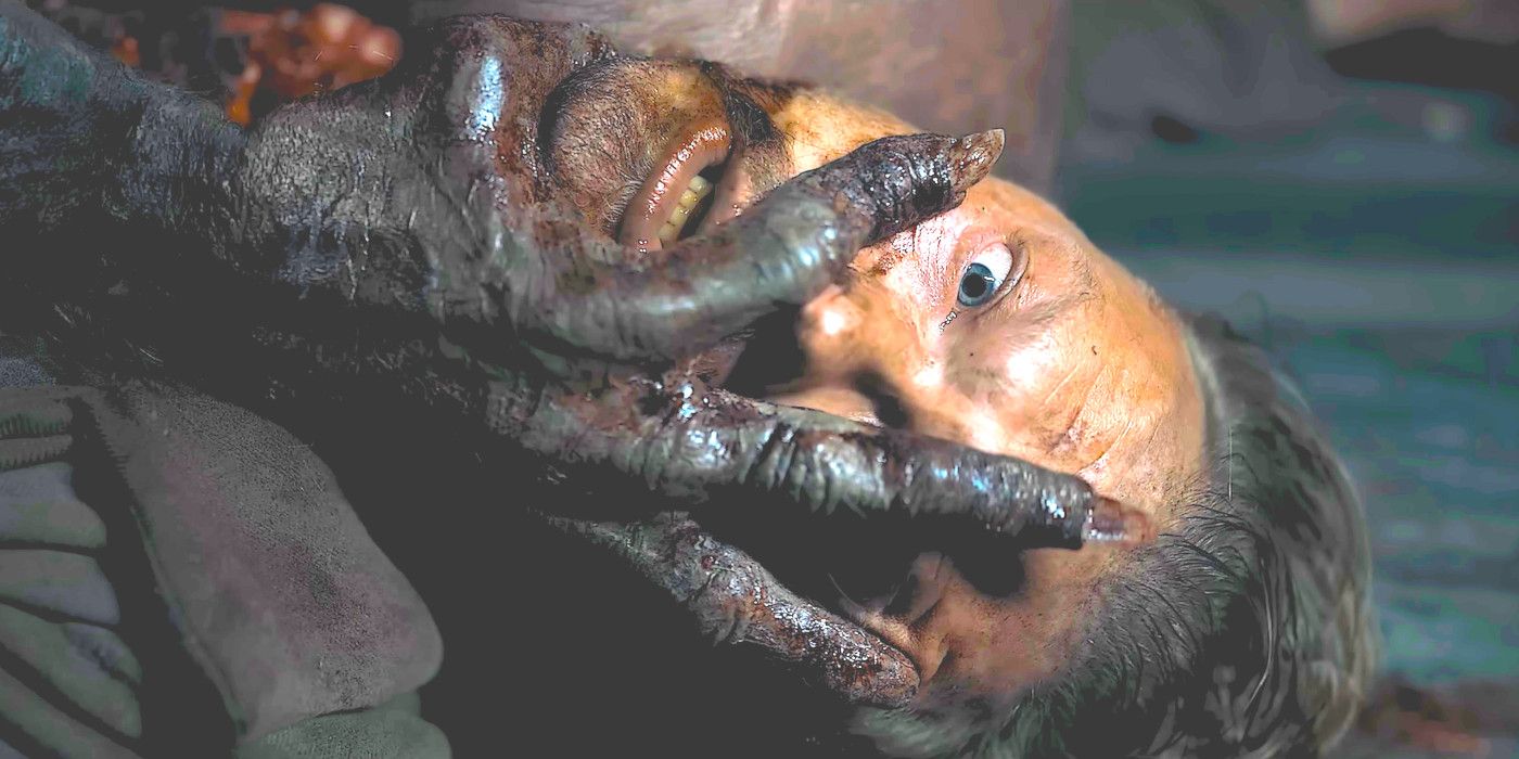 Dracula&rsquo;s gnarly black hand clutches a terrified man&rsquo;s face in The Last Voyage of the Demeter