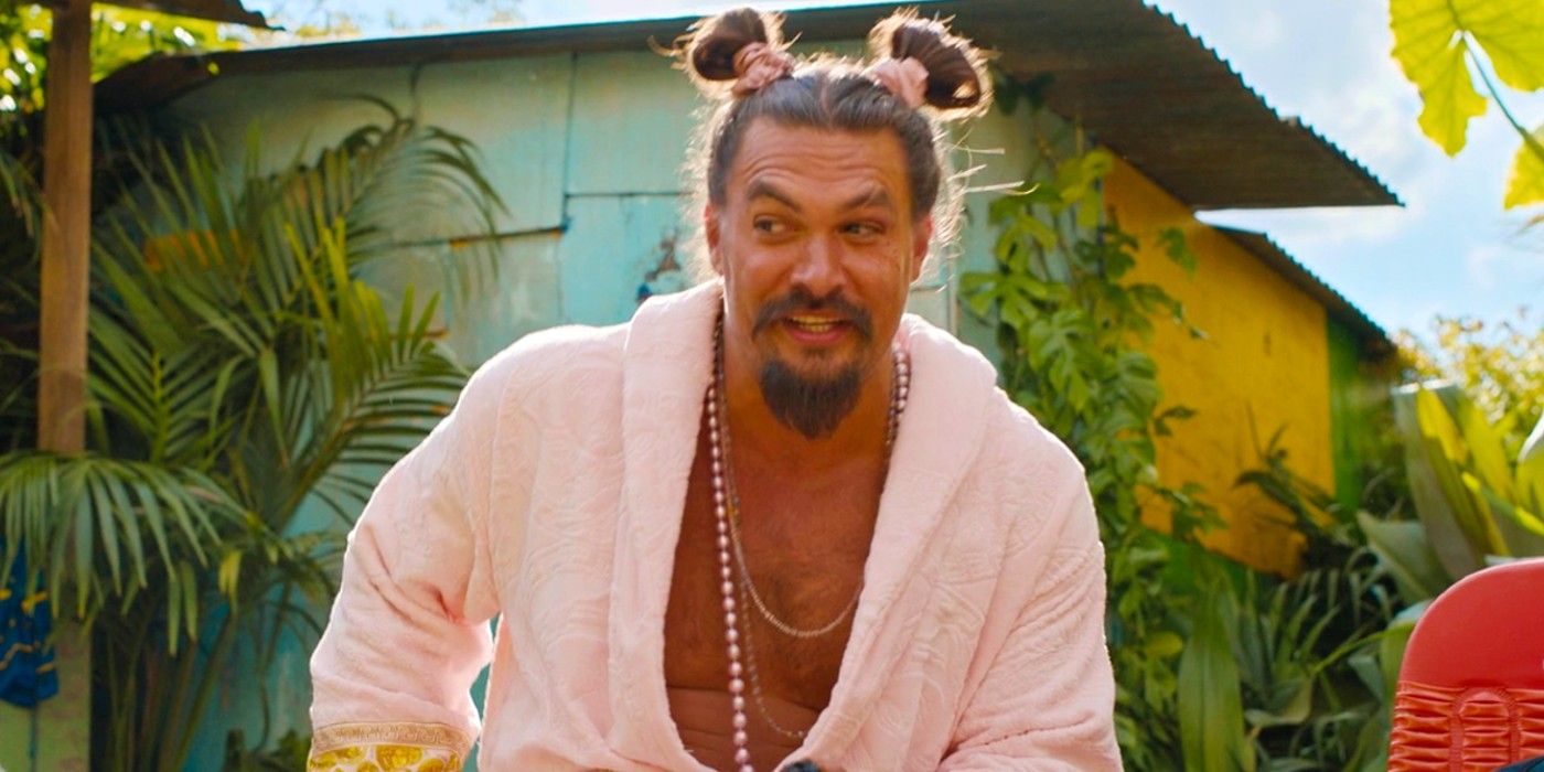 Dante (Jason Momoa) smiling with his hair up in buns in Fast X