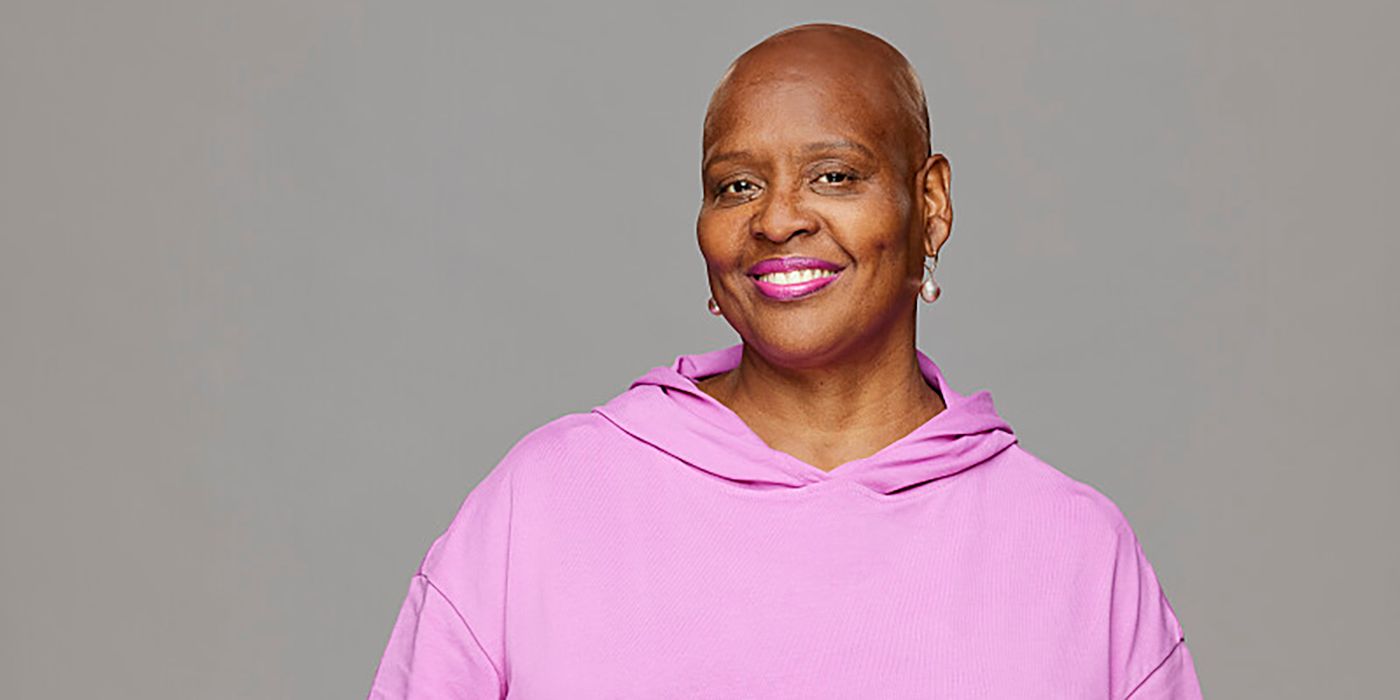 Felicia Cannon from Big Brother 25 wearing pink shirt against a gray background