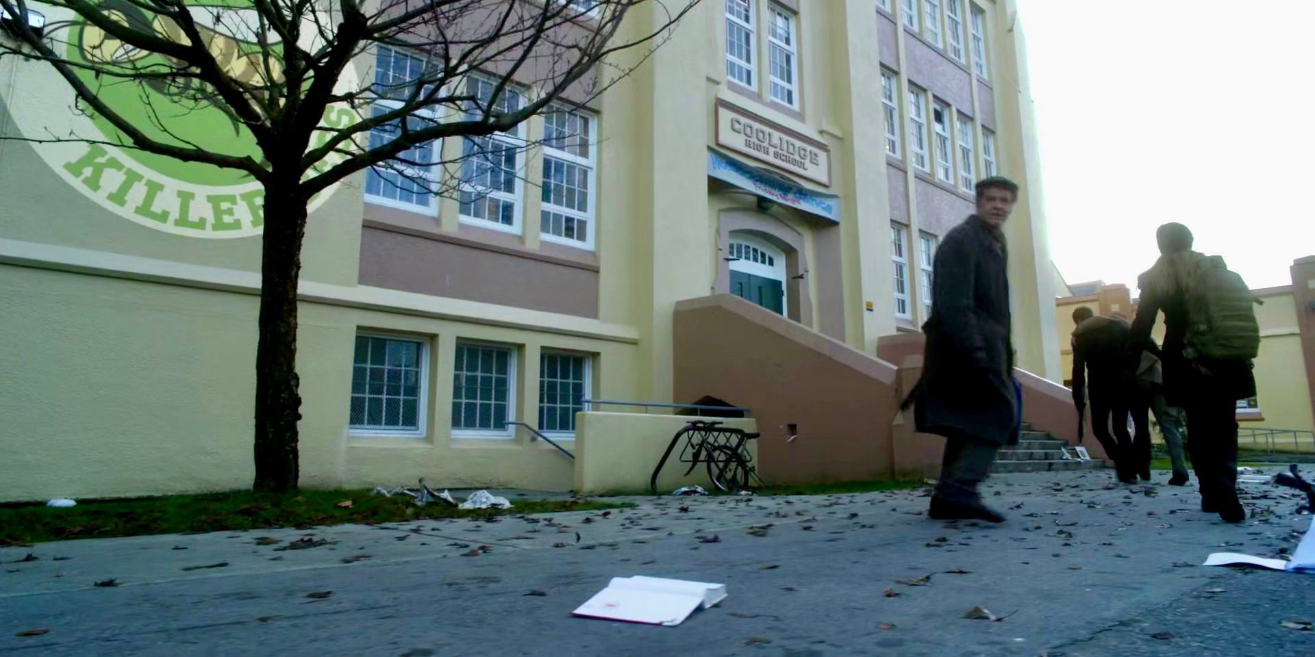 The group standing in an alley in Fringe