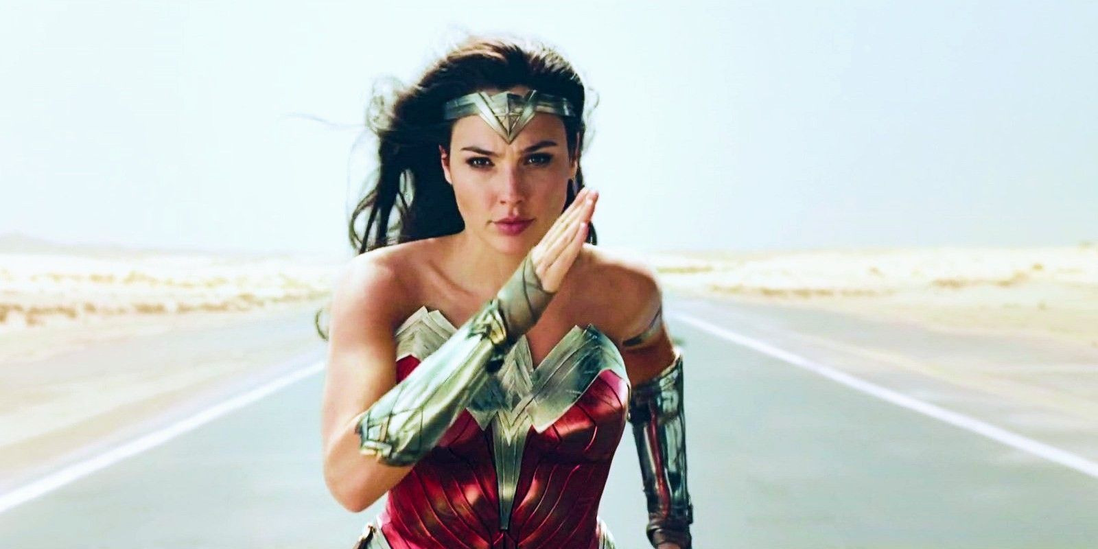 Gal Gadot running as Wonder Woman in Wonder Woman 1984.