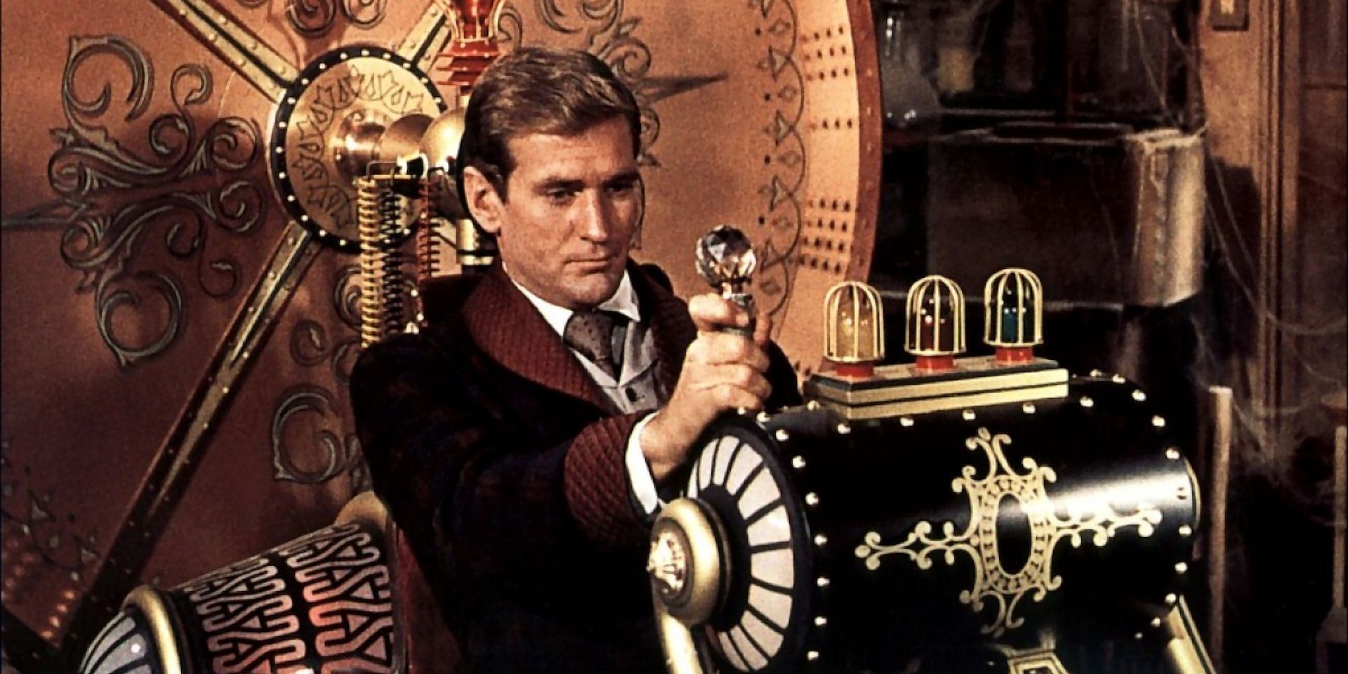 George sits on his time machine in The Time Machine