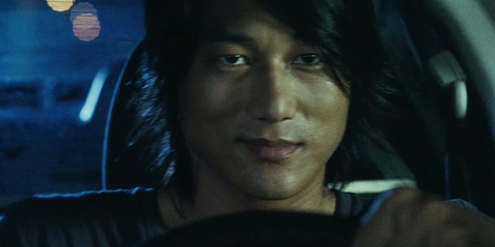 Han drives a car in Fast and the Furious Tokyo Drift