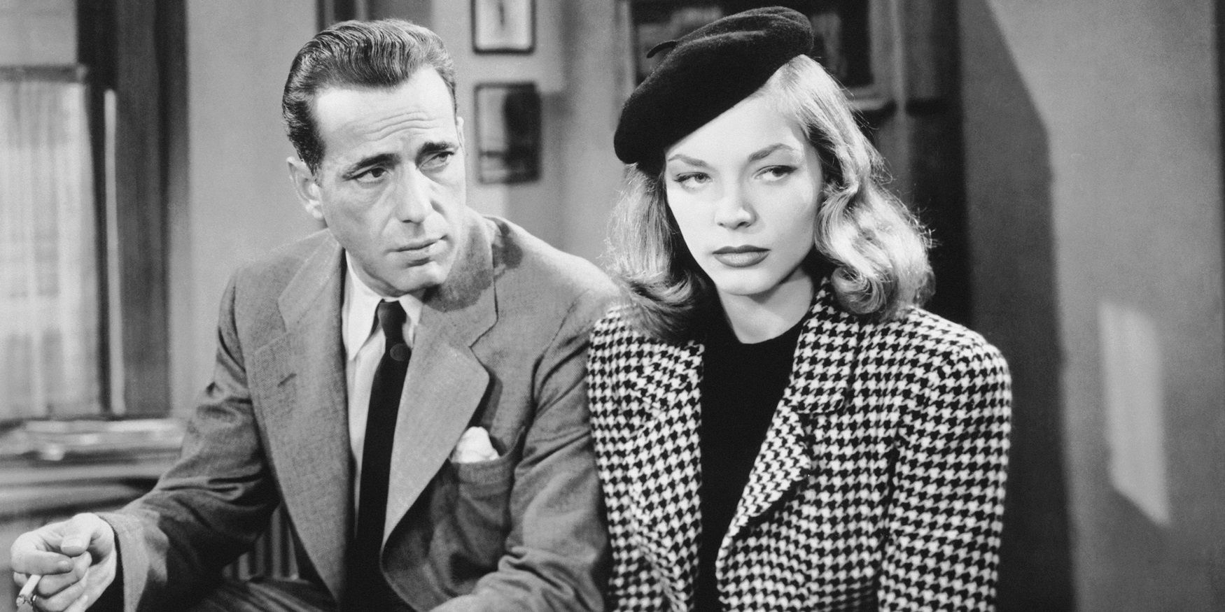Humphrey Bogart and Lauren Bacall in an office in The Big Sleep