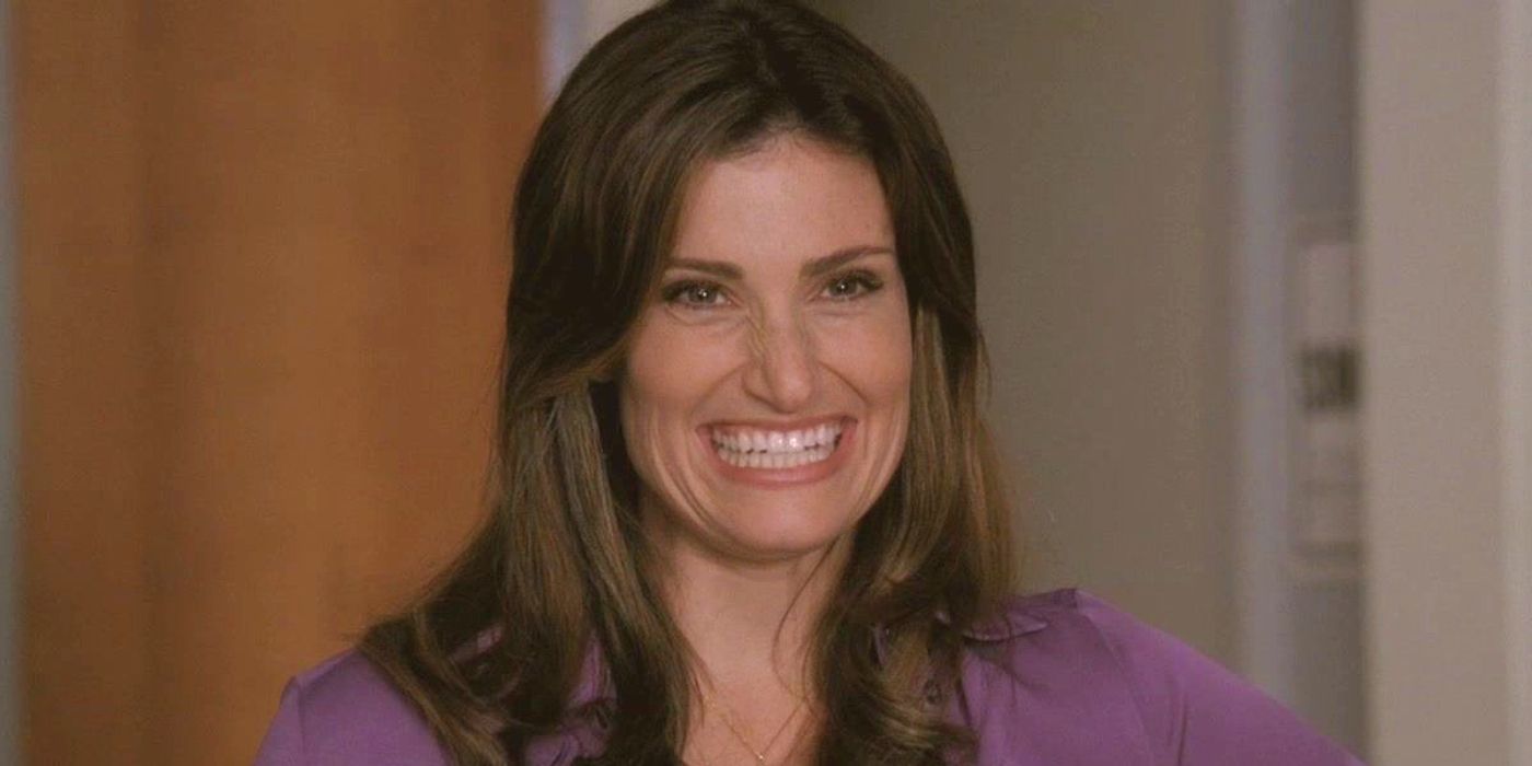 Idina Menzel as Shelby Corcoran smiling in Glee