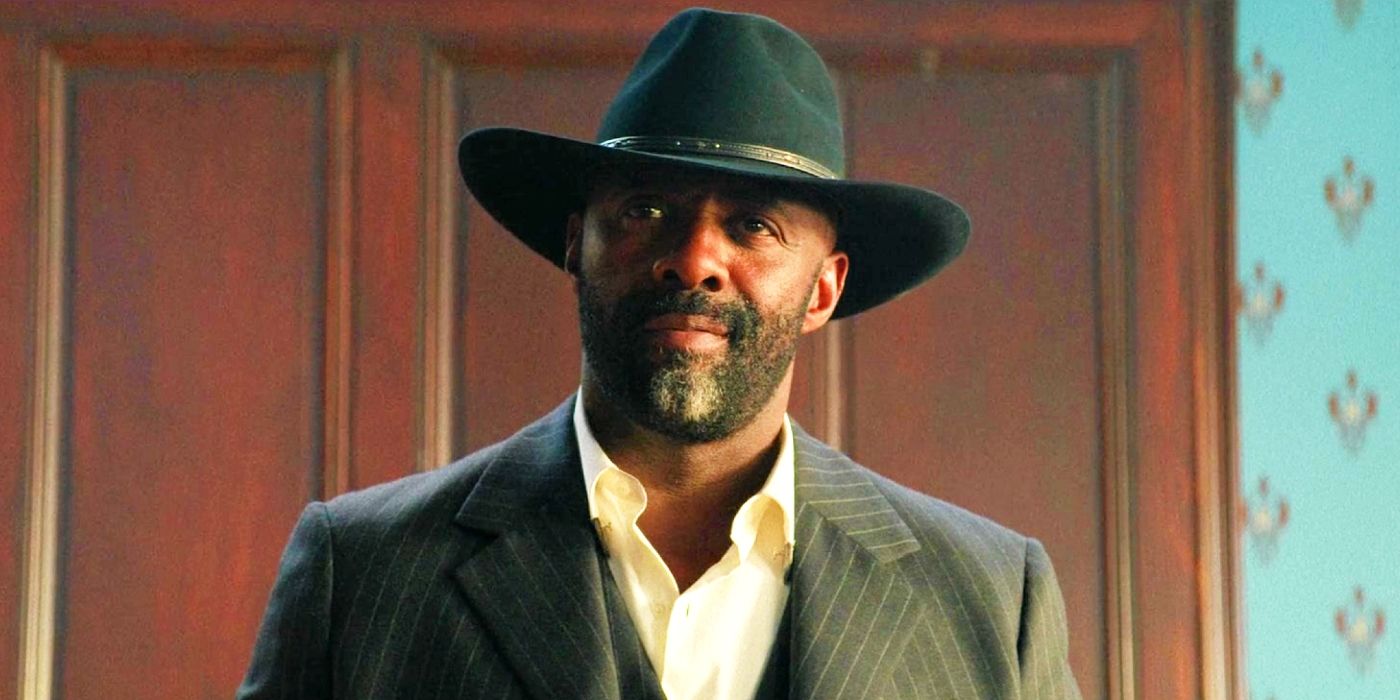 Idris Elba as Rufus Buck smirking in The Harder They Fall.