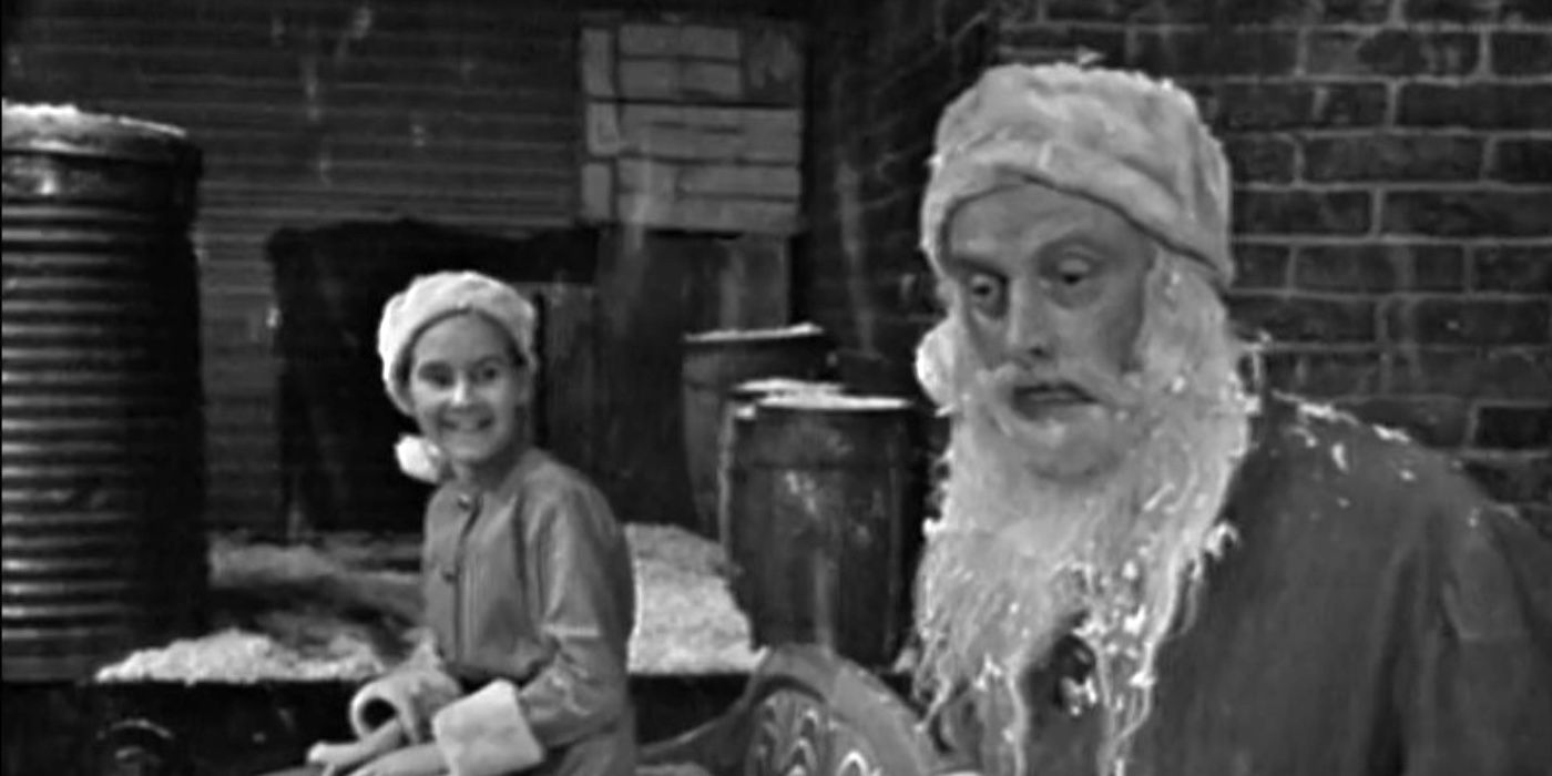 Art Carney as Henry Corwin with the elf by the sleigh in The Twilight Zone The Night of the Meek