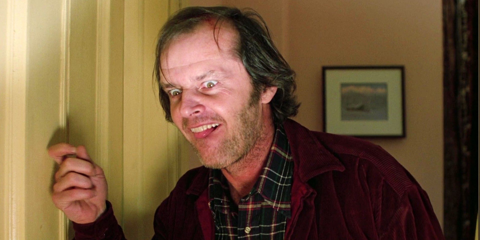 Jack Torrence knocking on the door in The Shining