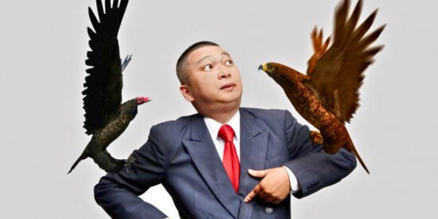 James Nguyen looking at CGI birds perching on his arms