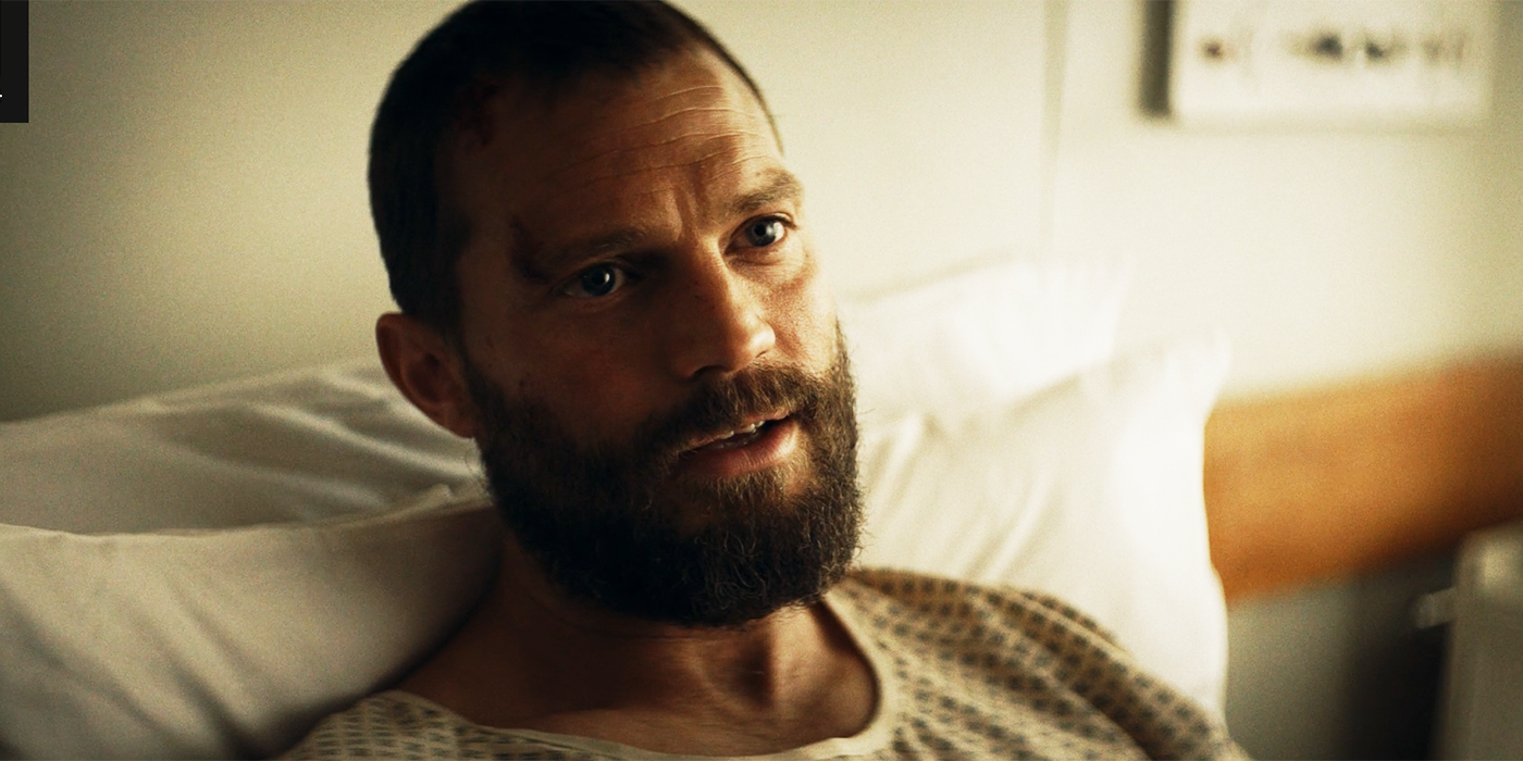 Jamie Dornan in a hospital gown and bed in The Tourist Season 1, Episode 1